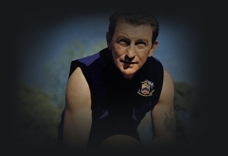 Colour photograph of footballer Jack Sheedy wearing his football guernsey.