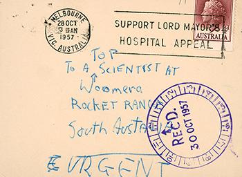 An envelope addressed 'To a top scientist at Woomera Rocket Range, South Australia, urgent' 28 October 1957.