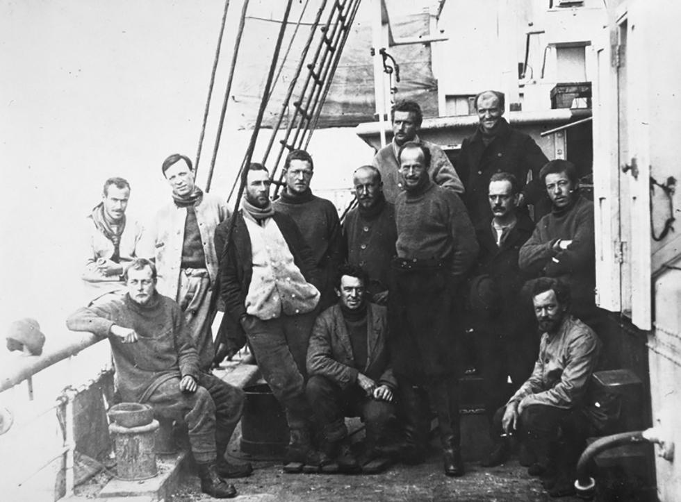Black-and-white photograph of Douglas Mawson with the rescue party returning to Australia.