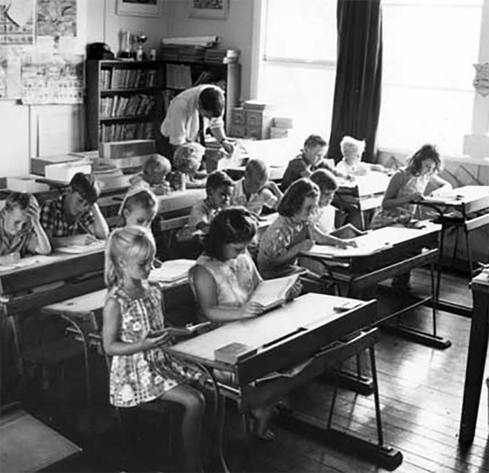 Children sitting in a classroom, in a school in Queensland.