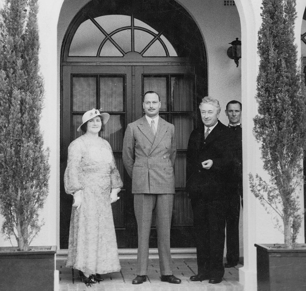 Enid Lyons, Joseph Lyons and Prince Henry, the Duke of Gloucester, standing outside The Lodge.