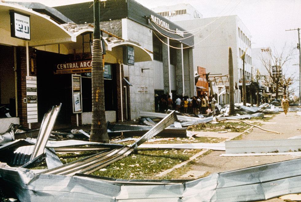 Central Arcade trees stripped of foliage and strewn with steel roofing.