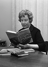 There at Three Humock Island on the 40th parallel, they became a modern day Swiss Family Robinson. Recently Mrs Alliston had a book published on the family's adventures on their island. Authoress, Mrs Eleanor Alliston, reading her first book, "Escape to an Island", which tells of her family's life on Three Humock Island.