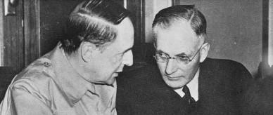 Prime Minister John Curtin meeting with American General Douglas MacArthur.