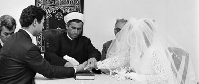 Young couple with a Turkish imam who performed the Muslin ceremony.