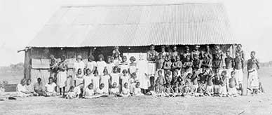 Aboriginal men, women and children at Oenpelli Church of England mission.