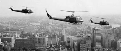 Royal Australian Air Force Iroquois helicopters flying over Sydney bound for Vietnam.