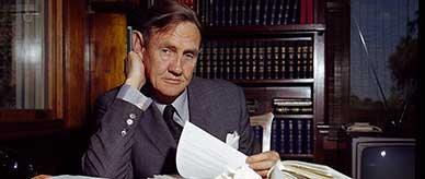 John Gorton seated at his desk in the prime minister's office in Old Parliament House.