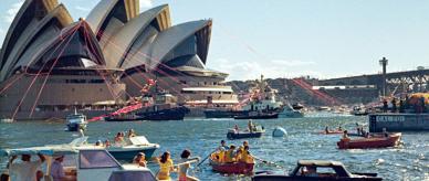 Festivals and celebrations - View from the Harbour of Sydney Opera House opening showing small boats, 1973