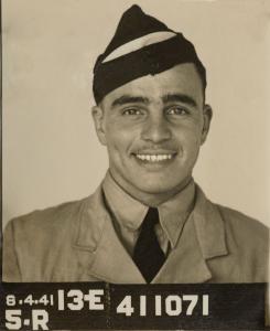 Identification portrait of Alexander Macdonald in his flying suit and cap, 1941