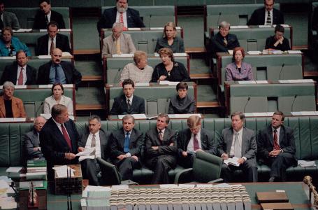 Kim Beazley standing at the despatch box, House of Representatives with memebers of the Australian Labour Party seated behind him