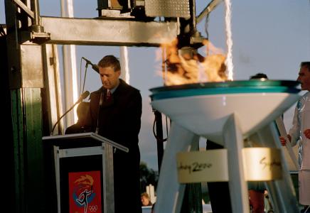 Deputy Prime Minister John Anderson beside the Olympic flame