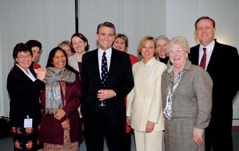 Deputy Prime Minister John Anderson and Treasurer Peter Costello standing with a women’s delegation