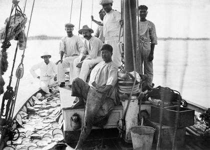 Crew gathered for a photo on a pearling lugger.