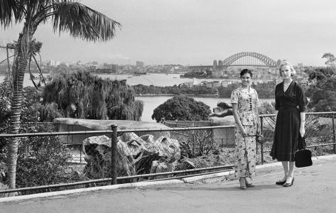 Ummi and Miss King standing with Sydney Harbour Bridge in the background.