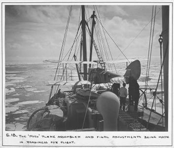 Gypsy Moth biplane onboard a ship .