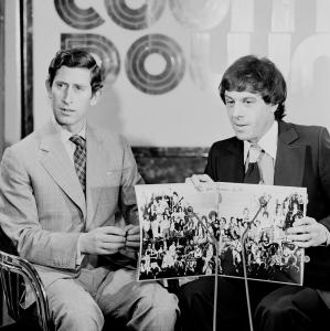 Prince Charles and Molly Meldrum with the record album cover.