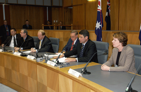 The Council of Australia Governments (COAG), comprising the prime minister, state and territory chief ministers, premiers, and the president of the Australian Local Government Association, gather for their 14th meeting, Canberra, June 2004. NAA: A14482, 040362DI-075 © Commonwealth of Australia, 2004