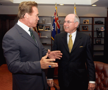 Governor of California and former Hollywood action star Arnold Schwarzenegger meets with  Prime Minister John Howard in Los Angeles to discuss gas partnership and Australians held in Guantanamo Bay detention camp, June 2004. NAA: A14482, 040270DI-030. AUSPIC photographer: Michael Jones © Commonwealth of Australia, 2004