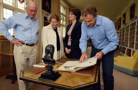 British Prime Minister Tony Blair (right) and his wife, Cherie, show Prime Minister John Howard and his wife, Janette, around Chequers, the PM’s country residence, during a break in Iraq-related discussions, Buckinghamshire, UK, June 2004. NAA: A14482, 040270DI-199. AUSPIC photographer: Michael Jones © Commonwealth of Australia, 2004