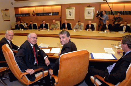 Attorney-General Phillip Ruddock (left), Prime Minister John Howard (second from centre) and Deputy Prime Minister John Anderson (centre) and other members of the National Security Committee (NSC), Australia’s peak defence and foreign policy decision-making body, meet in the Cabinet Room at Australian Parliament House, Canberra, March 2004. NAA: A14482, 040124DI-00. AUSPIC photographer: David Foote © Commonwealth of Australia, 2004