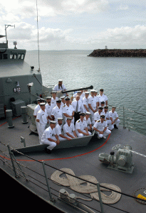 Prime Minister John Howard and his wife, Janette, flanked by crew members of HMAS Launceston, a patrol vessel tasked with border security operations, Darwin, January 2004. NAA: A14482, 040003DI-012. AUSPIC photographer: Michael Jones © Commonwealth of Australia, 2004