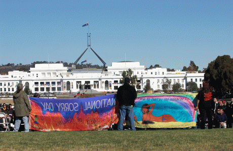 Protestors gather on National Sorry Day in front of Old Parliament House in recognition of the mistreatment and removal of Aboriginal and Torres Strait Islander people from their families, Canberra, May 2004. NAA: A14482, 040269DI-010. AUSPIC photographer: David Foote © Commonwealth of Australia, 2004