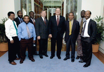 Speaker of the House of Representatives, Neil Andrew, and President of the Senate, John Calvert, with a parliamentary delegation from Papua New Guinea, Australian Parliament House, Canberra, March 2004. NAA: A14482, 040154DI-008. AUSPIC photographer: Michael Jones © Commonwealth of Australia, 2004