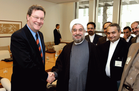 Foreign Minister Alexander Downer greets Hassan Rouhani, Iranian Secretary of the Supreme National Security Council (and future president of Iran), Australian Parliament House, Canberra, August 2004. NAA: A14482, 040442DI-001. AUSPIC photographer: David Foote © Commonwealth of Australia, 2004