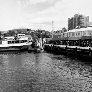 People waiting to board a ferry.