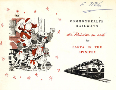 Drawing of children gathered around Santa and a train.